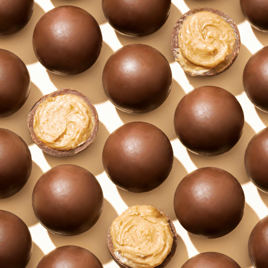Milk chocolate truffles with peanut cream filling 70g